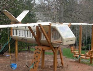 Airplane designed playground evokes a seaplane - Asheville Playgrounds