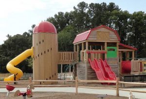 Barn and silo playground evoke the areas agricultural legacy - Asheville Playgrounds