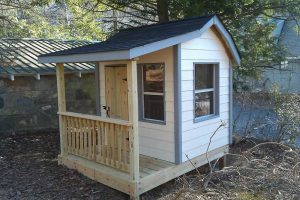 Playhouse with operable screened windows and shingled roof - Asheville Playgrounds
