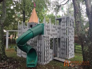 Castle Themed Playground With Swings, Drawbridge, and Spiral Slide - Asheville Playgrounds