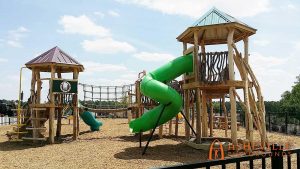 Tube slide and log climber playground set in Wendell Falls, NC - Asheville Playgrounds