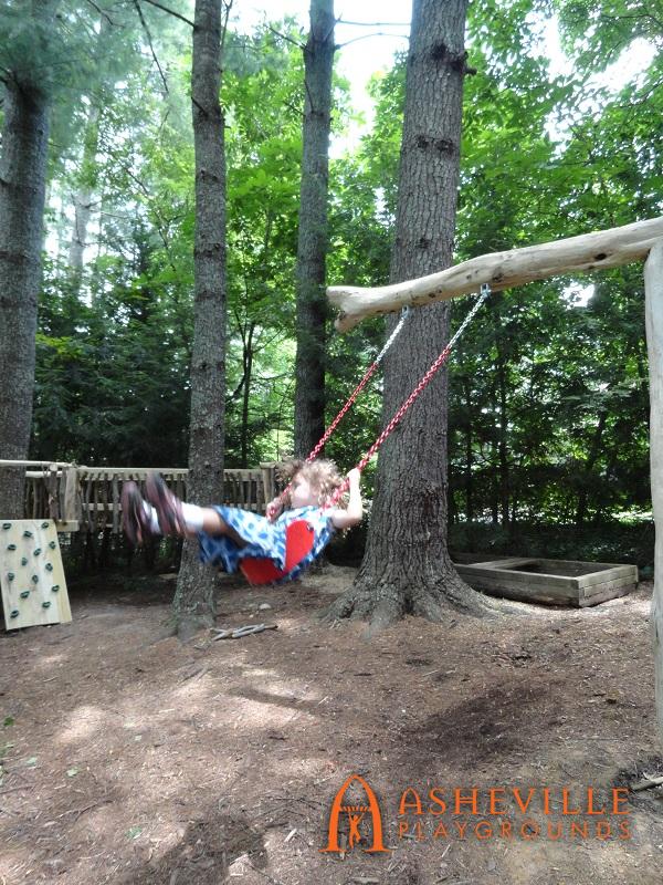 Cane Creek Montessori Kid Swinging